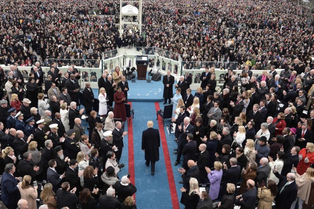 US President elect Donald Trump (C) arrives for the swearing-in ceremony on in front of the Capitol in Washington on January 20, 2017.  (Brendan Smialowski/Getty Images)